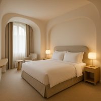 غرفة فندقية حديثة بزوايا منحنية ناعمة تبعث الشعور بالراحة النفسية